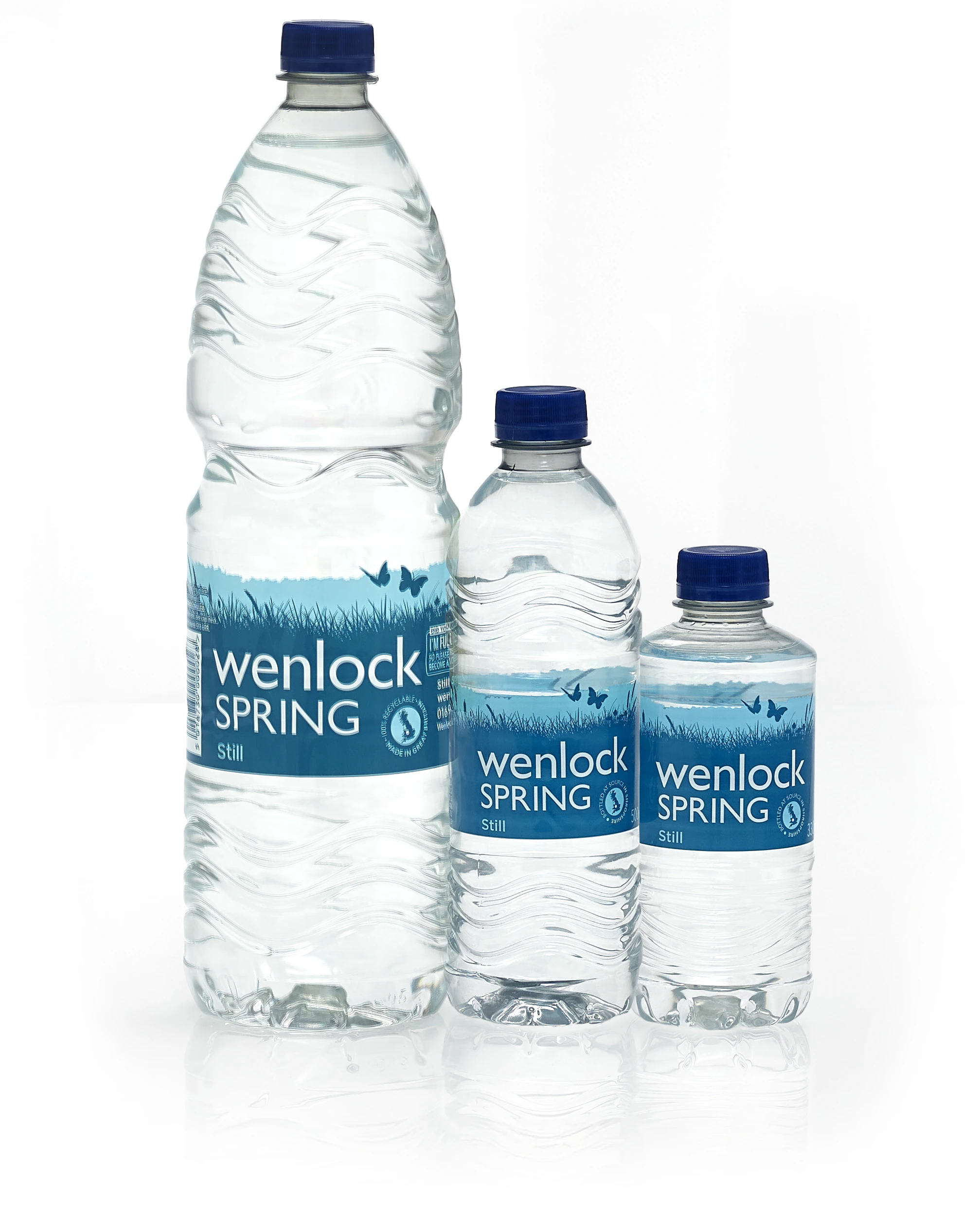 still natural spring water in glass bottles