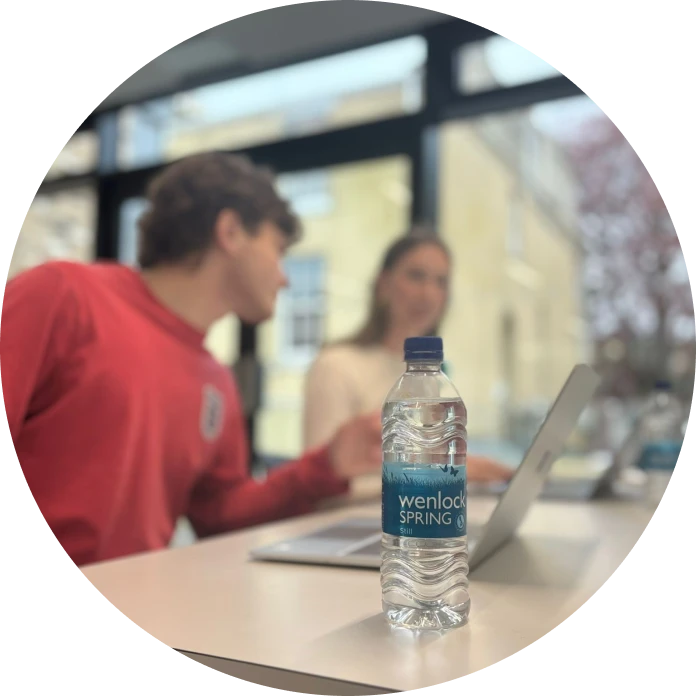 students enjoying water while they work