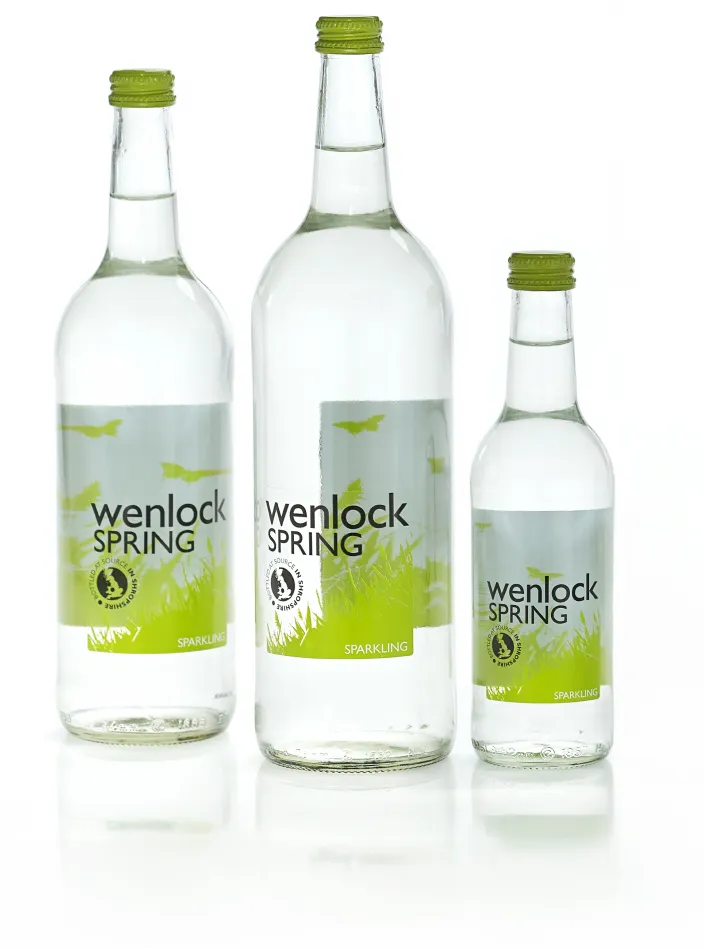 Spakling natural mineral water in glass bottles