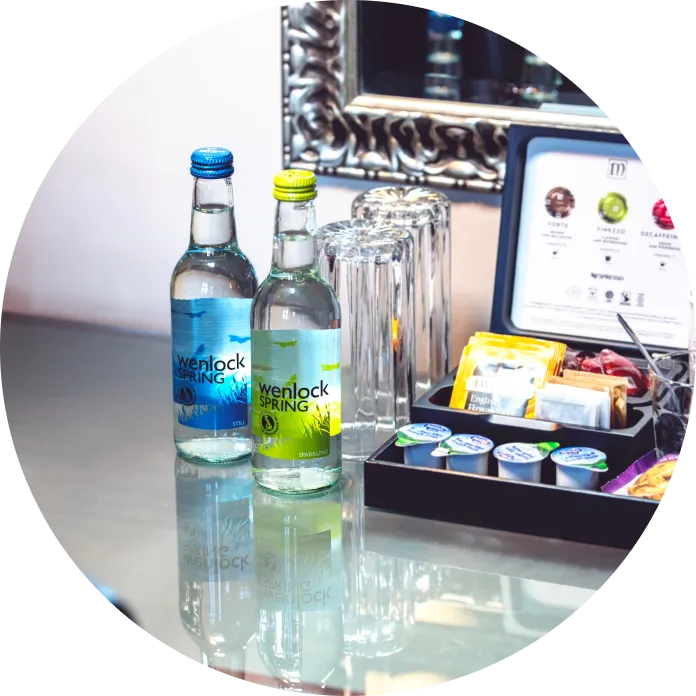 wenlock spring glass bottles displayed in a complimentary package